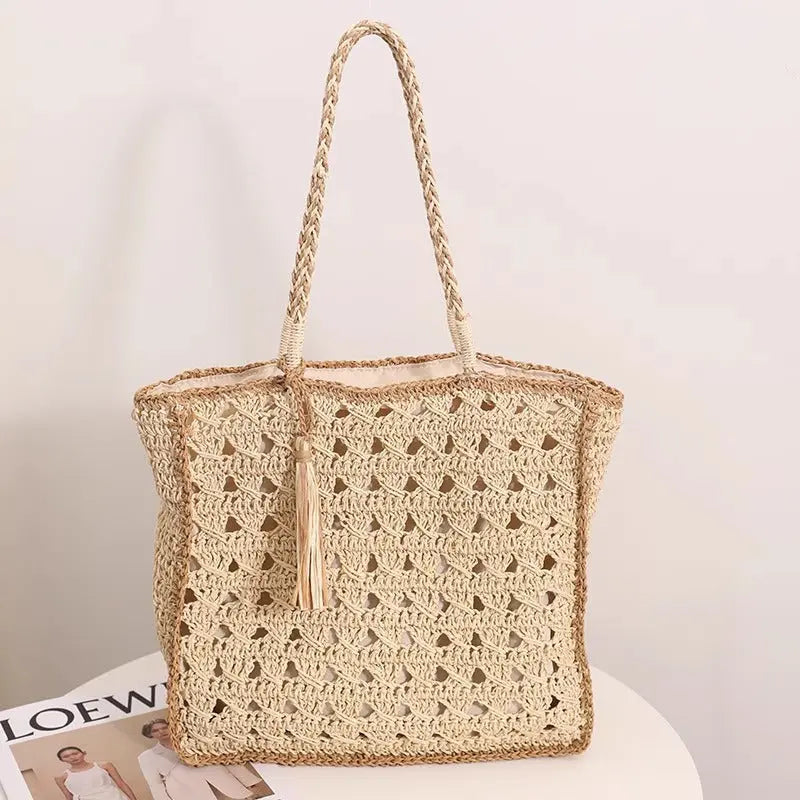 Square tassel single shoulder grass woven bag small fresh hollow handmade grass woven bag women's beach bag eprolo